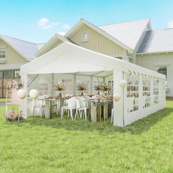 White outdoor event gazebo with sidewalls, arched windows, and open entrance