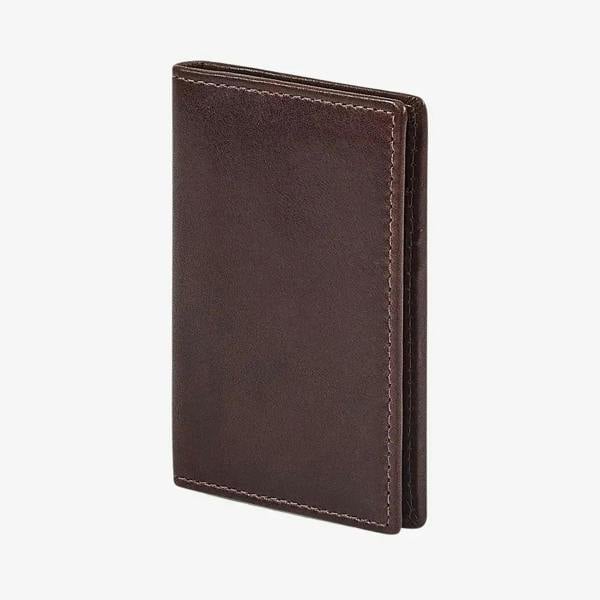 Side view of Brown leather card holder on a white background