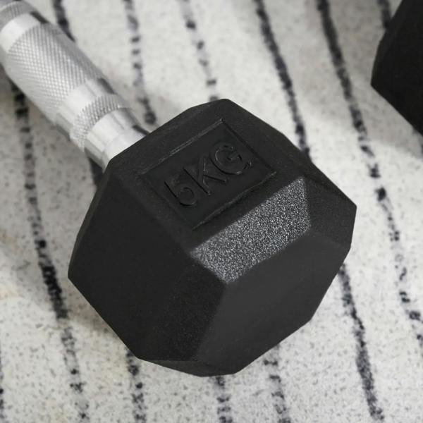 Black hex rubber dumbbell head with 5kg mark and textured finish