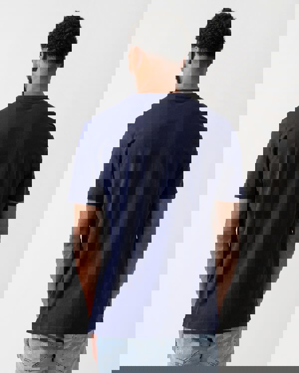 close up of a Model wearing a HUGO Dulivio Mens T-Shirt in Navy