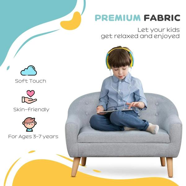Grey kids armchair sofa with button-tufted back, padded seat, and wooden legs