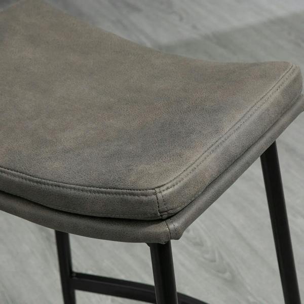 Grey curved bar stool seat upholstery with stitched seam and black frame