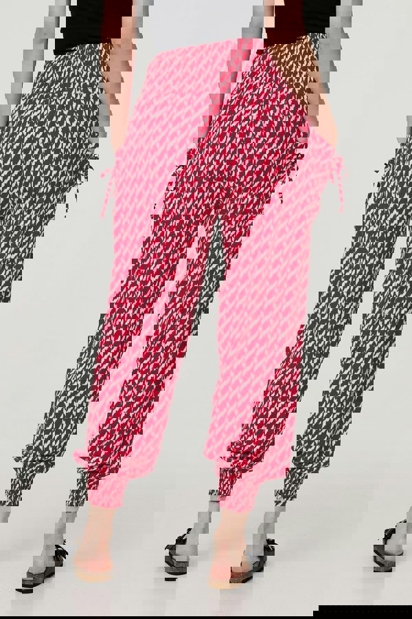 Red | Printed Tapered Harem Trousers