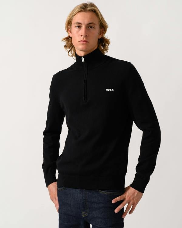 model wearing a HUGO San Quintus-C2 Mens 1/4 Zip Funnel Neck Jumper in Black 001