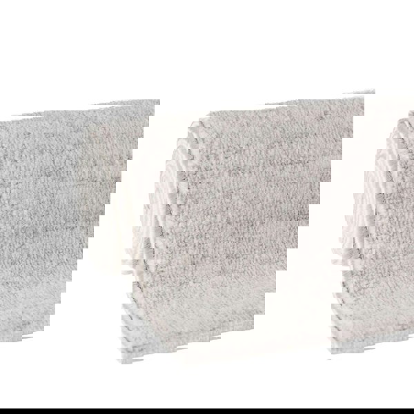 cream and grey rug features an abstract pattern