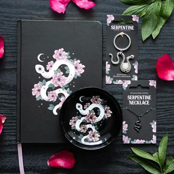 Snake keyring card showing rose quartz cabochon charm with floral accents