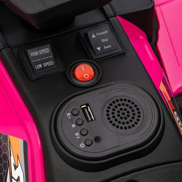 Pink quad bike console with button controls, speaker grille, and red power light