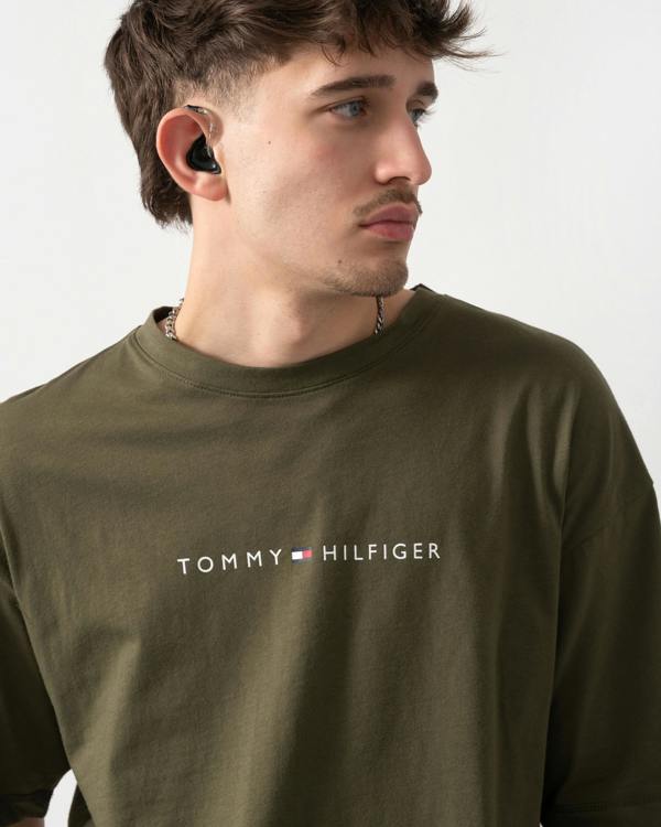 close up shot of a model wearing a Tommy Hilfiger Logo Mens Lounge Tee in Army Green