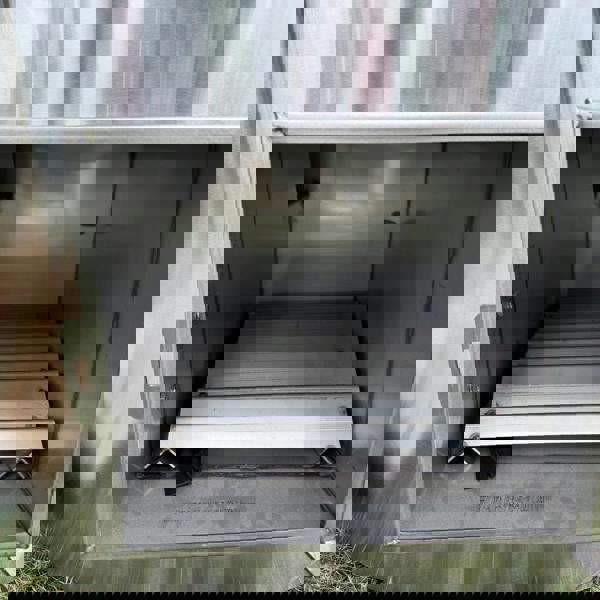 Layzee Living wood-fired tubs inside of heater