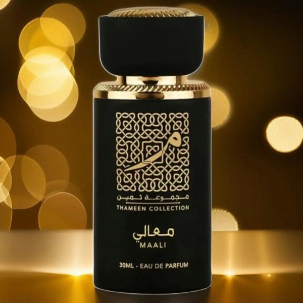 Lattafa Maali Thameen Collection Perfume 30ml EDP Black and gold perfume bottle with intricate design on a blurred lights background