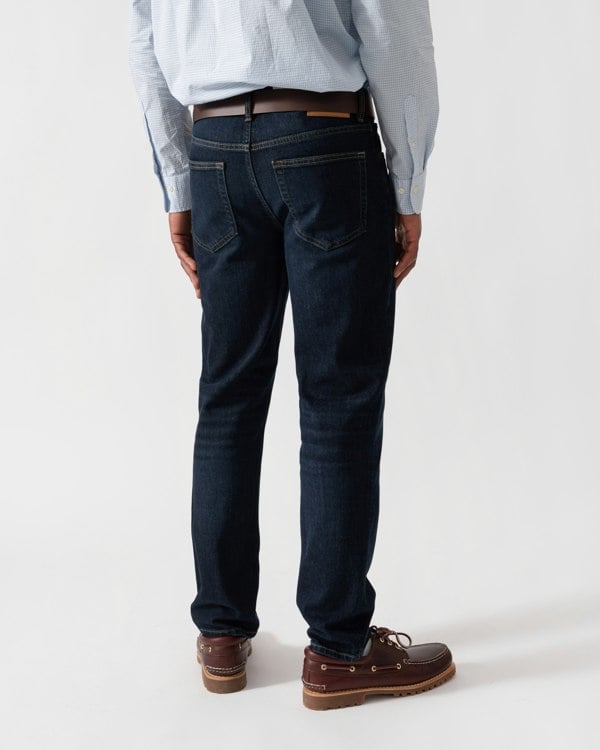 Model wearing GANT Mens Regular Fit Gant Jeans in 962 Dark Blue Broken In - back