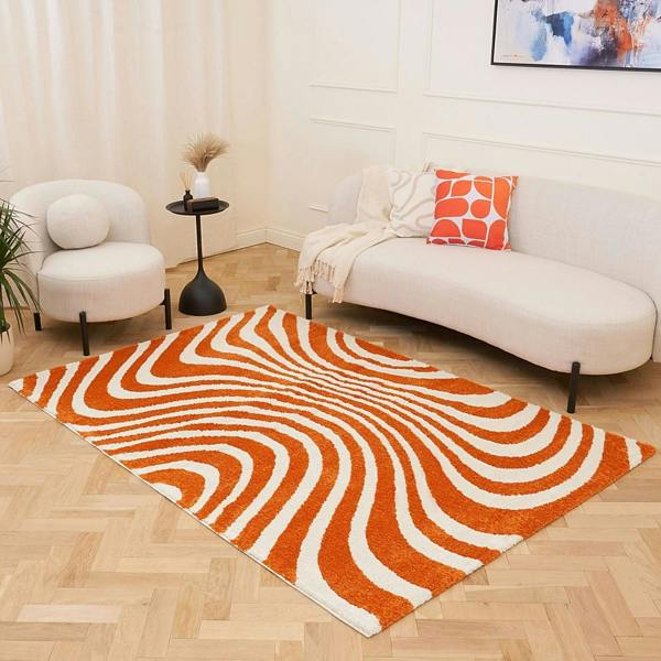 Patterned fabric with orange and white wavy lines