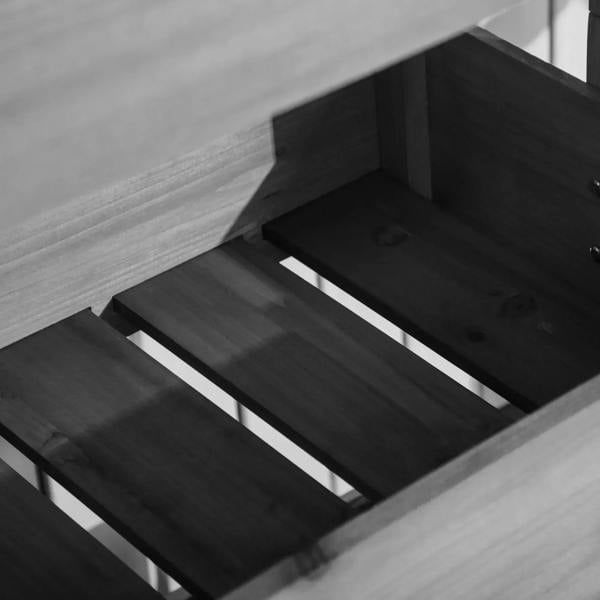 Close-up of dark grey wooden slats inside a four-tier plant stand planter