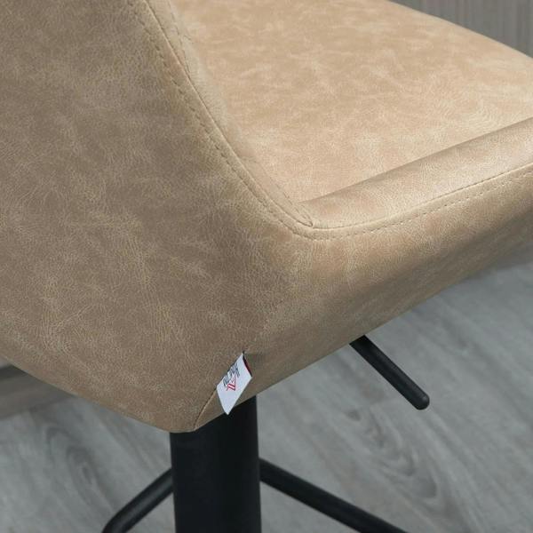 Light khaki upholstered bar stool seat with stitched edge and black support stem