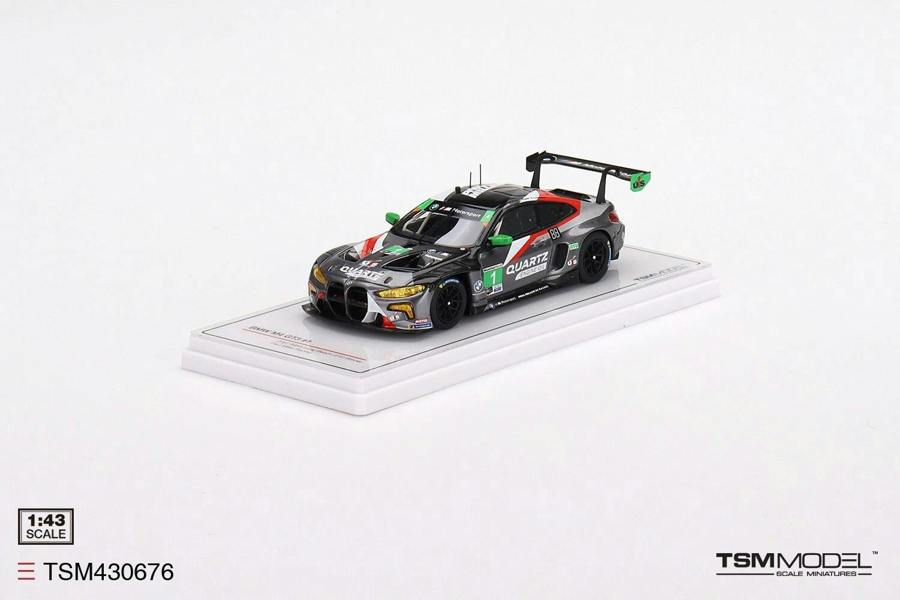 a toy car on a white surface