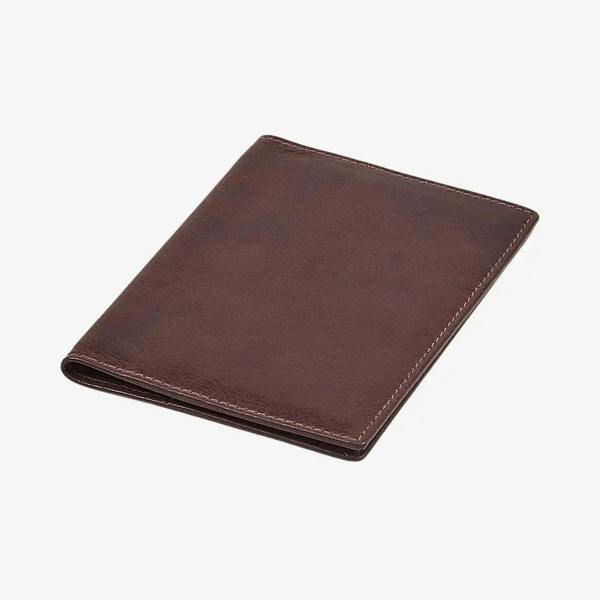 Top view of Brown leather passport holder on a white background