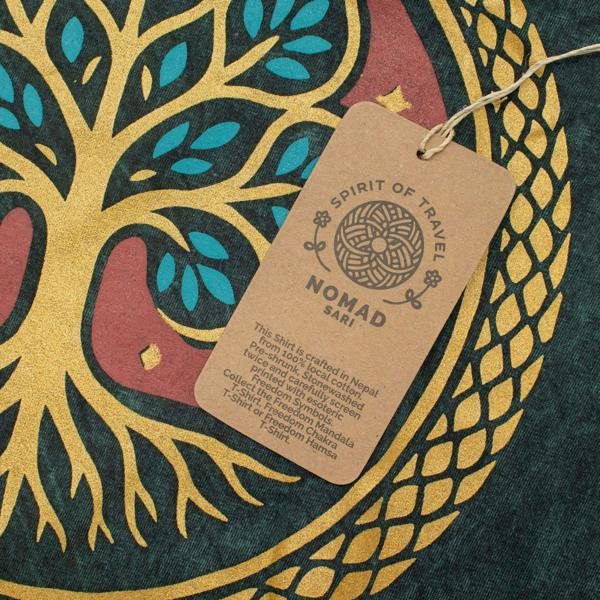 Tree of Life print detail on green cotton T-shirt with hanging tag