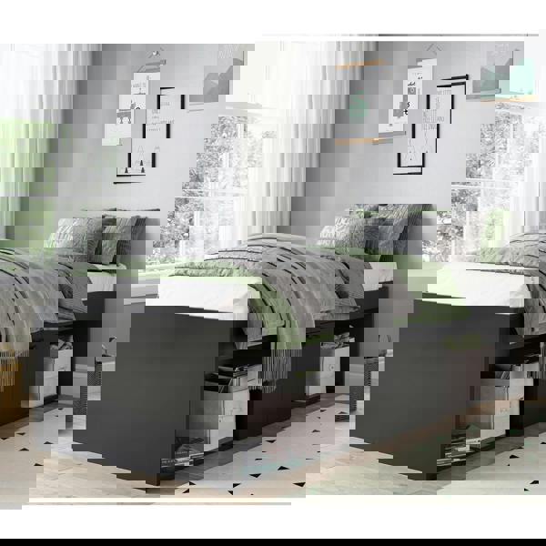 Bed frame in a modernly decorated bedroom.