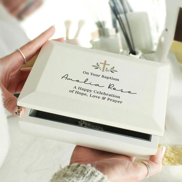 Personalised white Baptism jewellery box for Amelia Rose held in hands.
