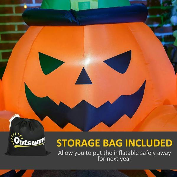 Close-up inflatable jack-o'-lantern pumpkin face with black witch hat