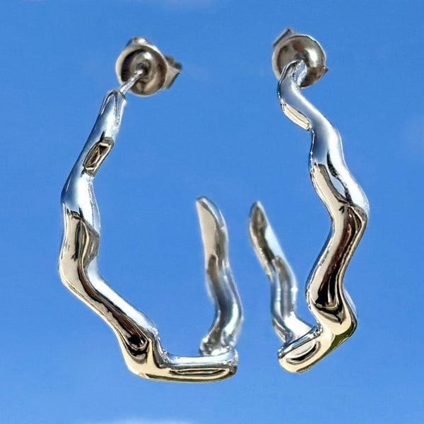 Silver wavy hoops by LENAE London, ocean-inspired earrings.