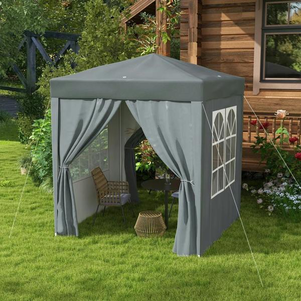 Grey pop-up gazebo party tent with side window panels and draped front curtains