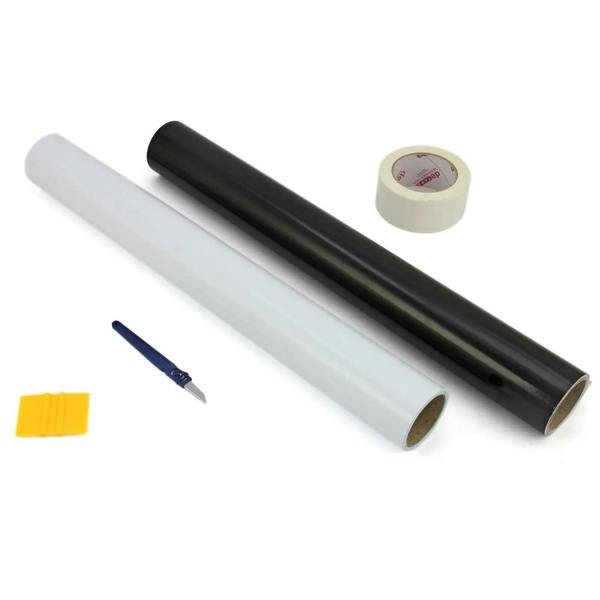 Black and white vinyl rolls, a weeding tool, and transfer tape, ideal for crafting with the 38cm Clam Press and vinyl cutter