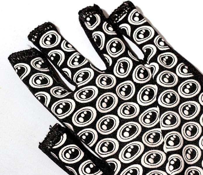 Close-up of black Optimum Stik Mits fingerless glove palm with all-over white oval grip print on white - Optimum