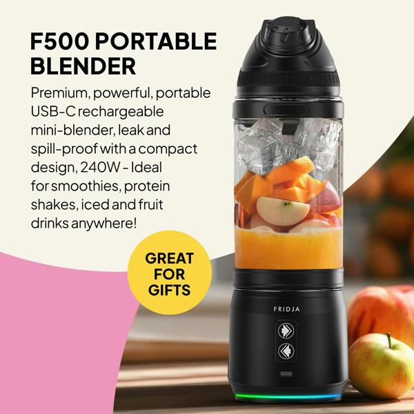 A black Fridja f500 Portable Blender from the Kitchen Trio sits beside apples, filled with fruit. USB-C rechargeable and powerful, it’s perfect for smoothies and more—a compact alternative to the f800 Citrus Juicer. Great for Gifts badge shown.
