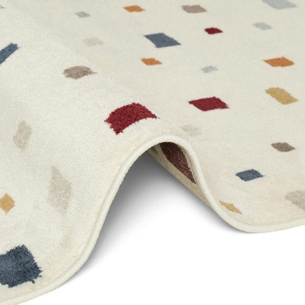 Close-up of a textured rug with colorful geometric patterns on a white background