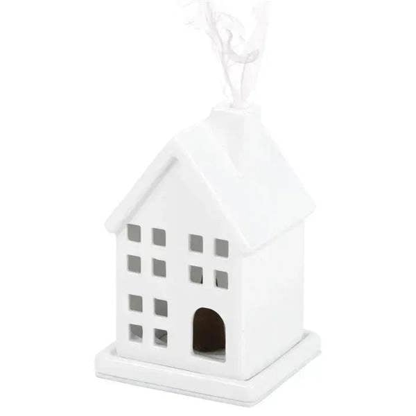 White ceramic house incense cone holder with window cutouts and arch front opening