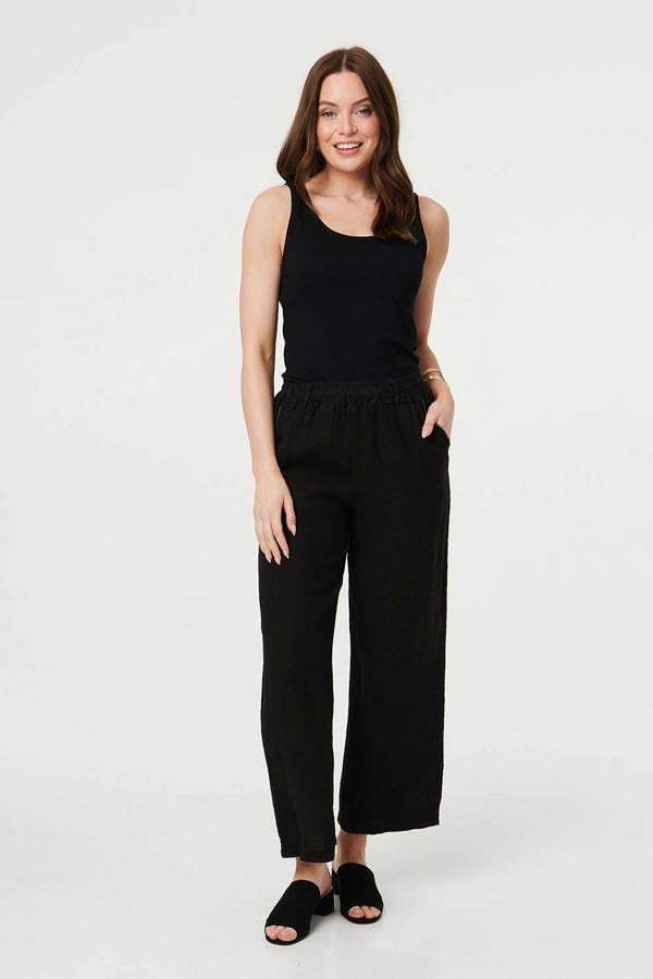 Black | High Waist Wide Ankle Length Trousers : Model is 5'9"/175 cm and wears UK8/EU36/US4/AUS8