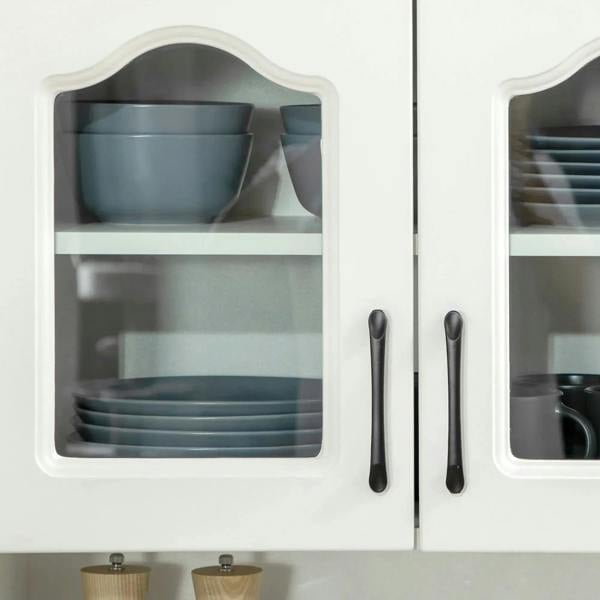 White cabinet door panels with internal shelves holding dark dishware and cups