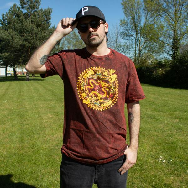 Maroon stonewashed cotton T-shirt with yellow dragon mandala graphic, worn outdoors