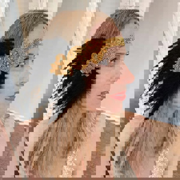 flapper headband in gold with beading and feathers hair down