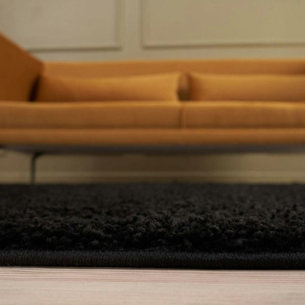 Black shaggy Rug Plain design thick pile, high quality, soft & durable.