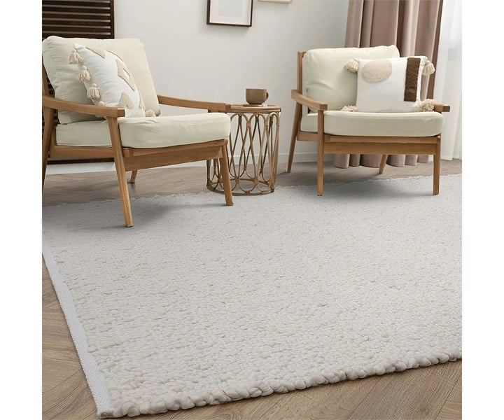 High-end boucle rug enhancing a contemporary living space with soft texture and style.