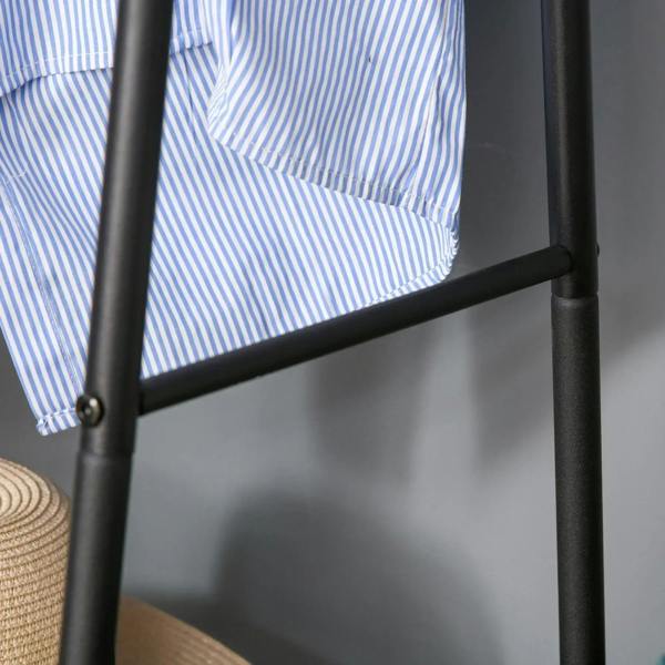 Close-up of black metal shelf support bar on hanging coat rack