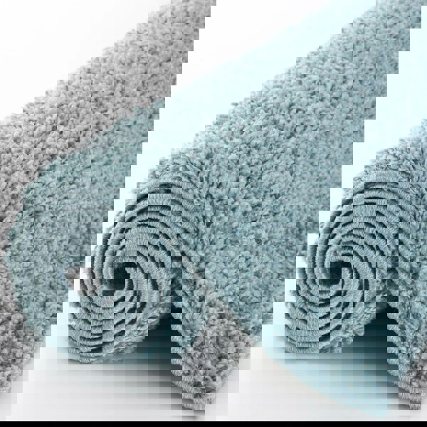 Shaggy duck egg blue rug high quality, thick pile 30 mm, easy to clean.