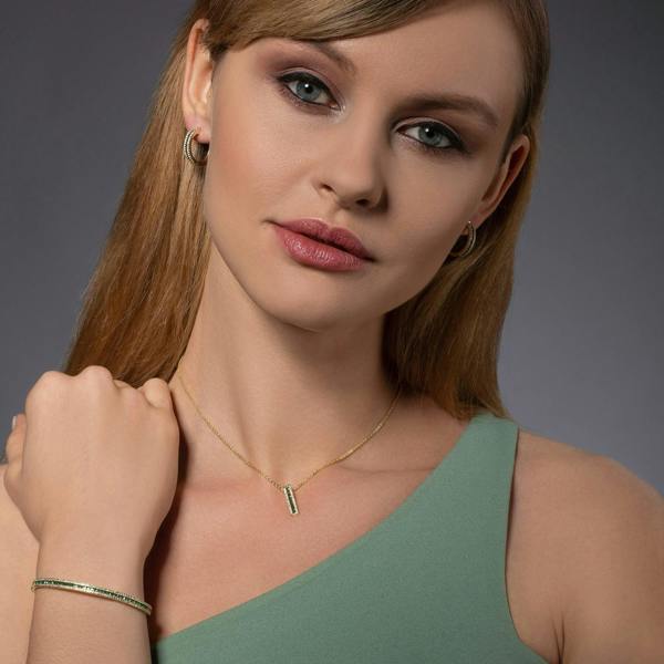 Gold Cuff Bangle Bracelet with Green Cubic Zirconia Stones - namana.london