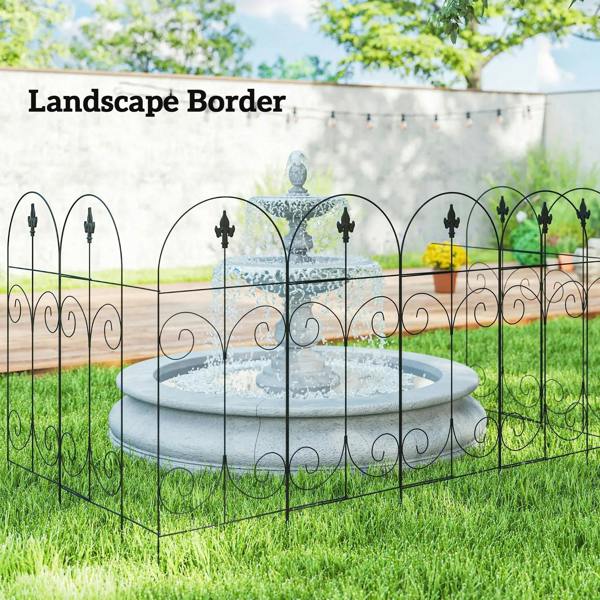 Black metal landscape border fence with arched sections and finial-topped pickets