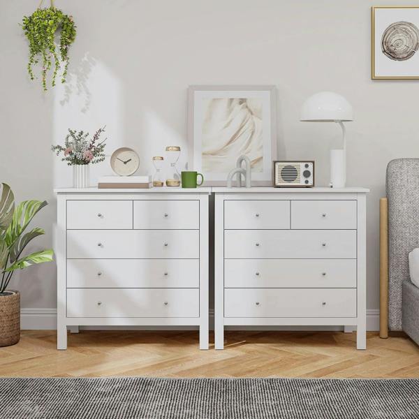 White 5-drawer dresser pair with round knobs and long top, matching modern chests