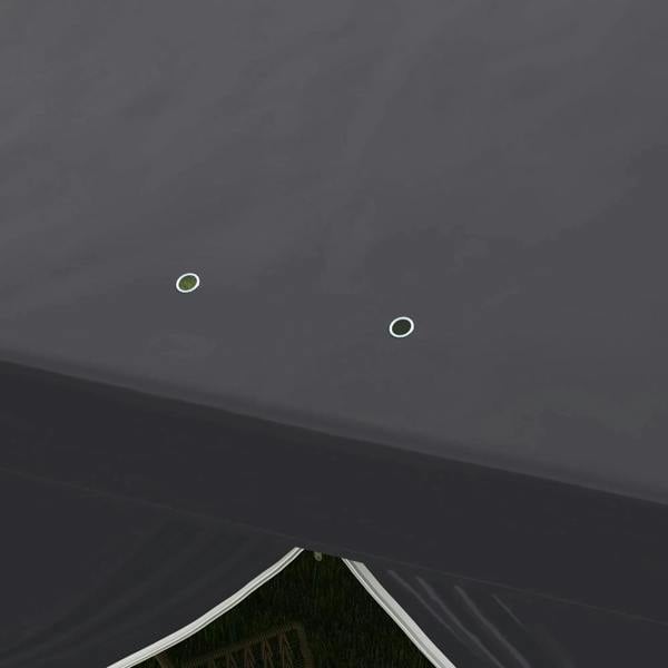 Grey gazebo tent roof close-up showing fabric seam and attachment grommets