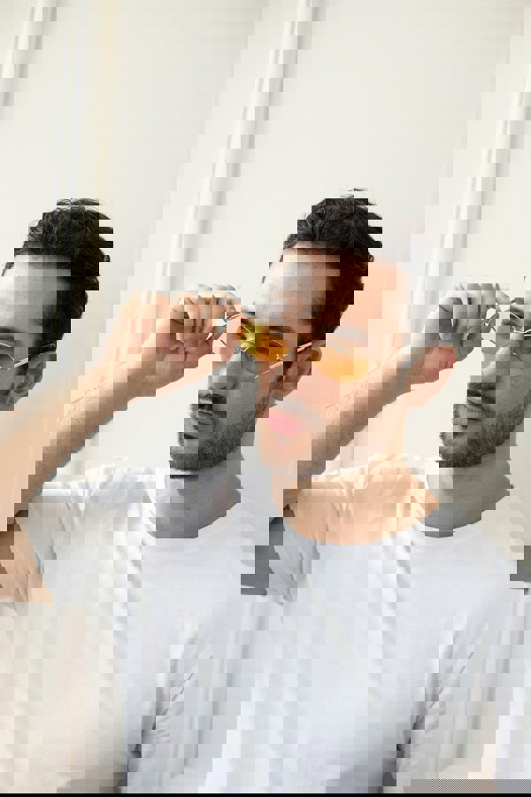 SVNX Metal Oval Frame Sunglasses with Orange Lenses