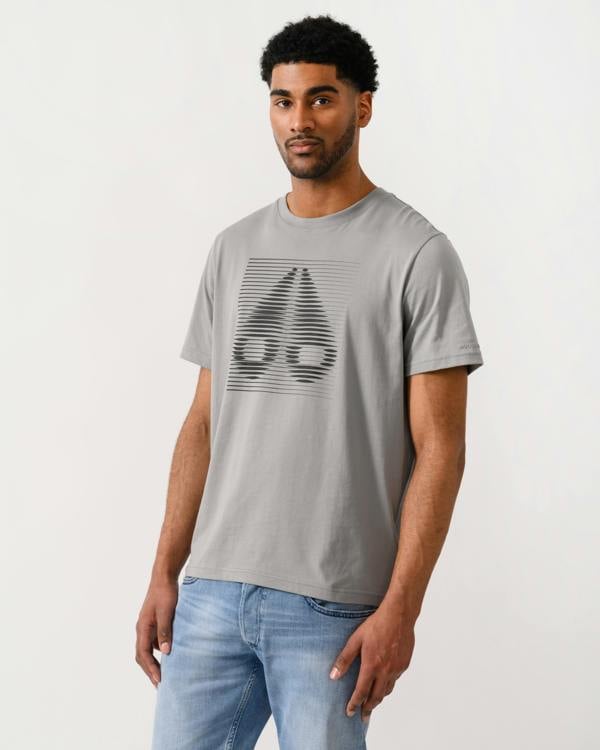model wearing a Moose Knuckles Raydaze Mens T-Shirt in Industry 1892 colourway