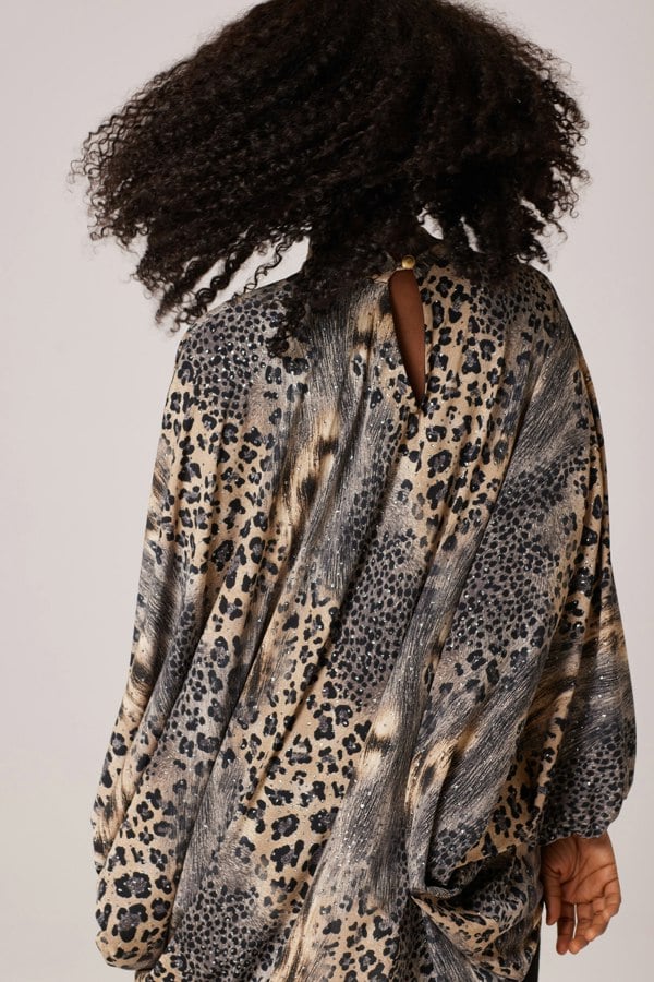 SparklingSafariChic, GlitteredLeopardLuxury, ShimmeringFelineEssence, DazzlingCheetahElegance, LustrousLeopardDrape, TwinklingWildGlam, RadiantJungleCouture, GlimmeringLeopardStyle, GleamingCheetahTunic, GlamorousSpotsEnsemble,