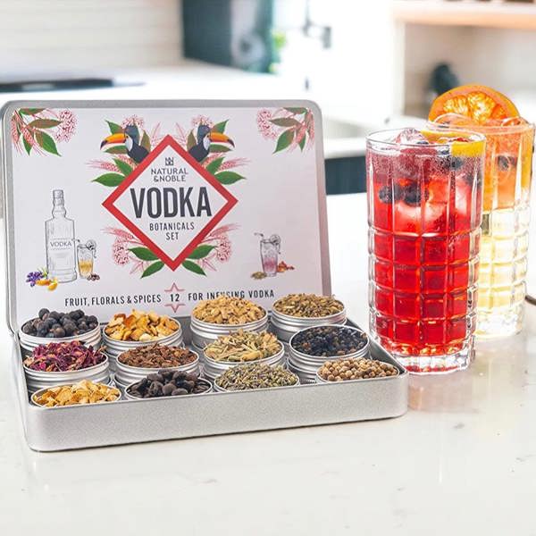 Natural & Noble DIY Vodka Kit Alongside Two Vodka Cocktails 