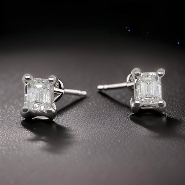 Vintage Tom A NEW pair of emerald cut diamond stud earrings