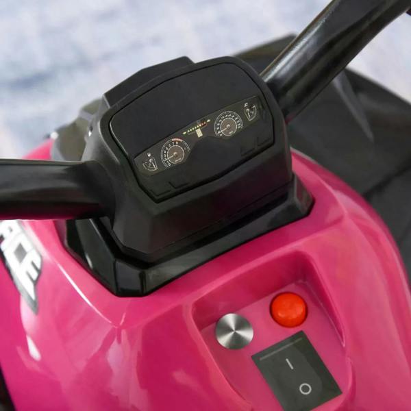 Close-up of pink ride-on motorcycle toy control panel with buttons and display