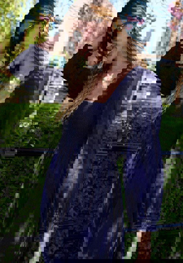 lifestyle image with model wearing Pippa Shirred Bodice Maxi Dress In Navy - image 4